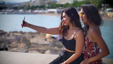 Pretty Arab / middle eastern girls taking selfies Stock Footage 78366476