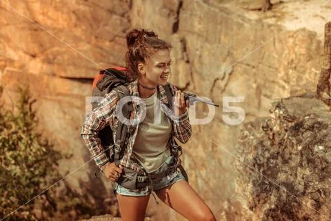 Pretty attractive woman holding a portable radio set Stock Photos