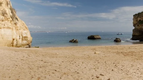 Pretty beach surrounded by Cliffs. Stock Footage 107535488