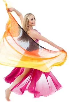 Pretty belly dancer performing Stock Photos