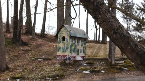 Pretty birdhouse moving in the wind Stock Footage 270095541