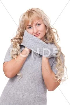 Pretty blond winter sweater woman Stock Photos