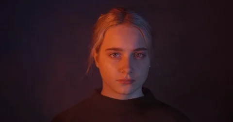 Pretty Blonde Powerful Female Model. Staring Down The Lens In Smoke. Stock Footage 109567015