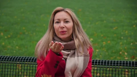 A pretty blonde sends an air kiss Stock Footage 255073725