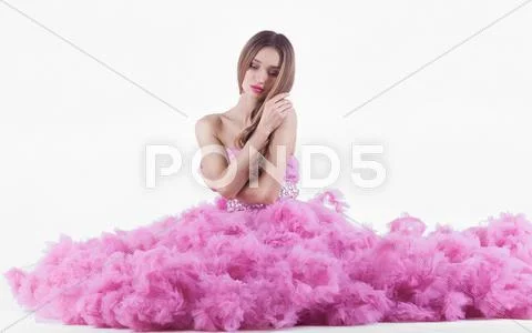 Pretty blonde woman in fashion dress Stock Photos
