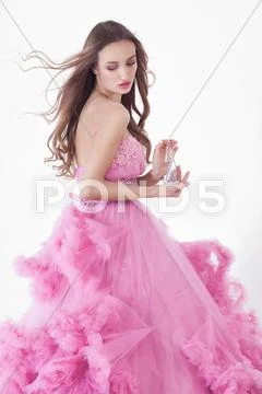Pretty blonde woman in fashion dress Stock Photos