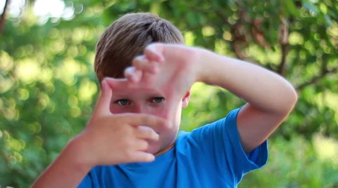 Pretty Boy Creating A Frame With Fingers Stock Footage 40671136