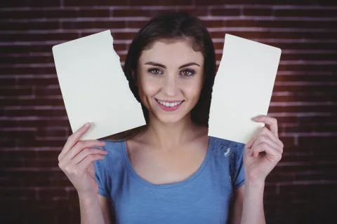 Pretty brunette holding two pages Stock Photos