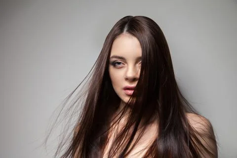 Pretty brunette looking at camera Stock Photos