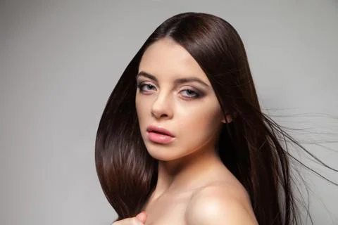 Pretty brunette looking at camera Stock Photos