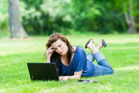 Pretty Brunette Model On Computer Stock Photos