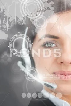 Pretty businesswoman using futuristic interface Stock Photos