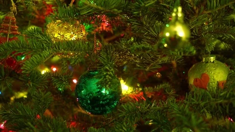 Pretty Christmas tree close up tracking shot with lights and ornaments Stock Footage
