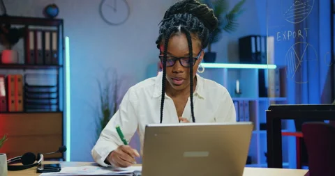 Pretty concentrated smart experienced hardworking african american businesswoman Stock Footage 166688337