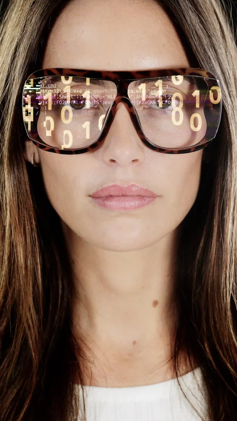 A pretty female with glasses with code in vertical Stock-Footage 319959169