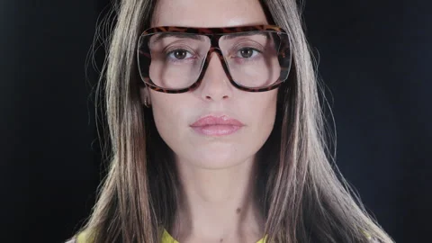A pretty female with glasses Stock Footage 319864281