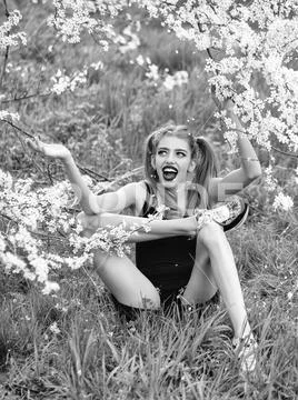 Pretty girl in blossom Stock Photos