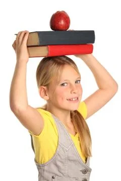 Pretty Girl with Books and Apple Stock Photos