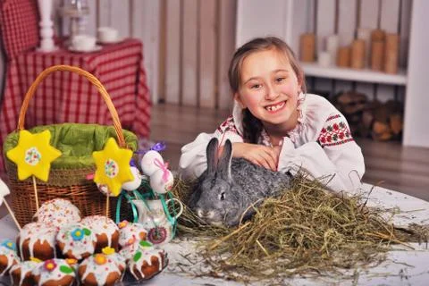 Pretty girl  with easter rabbit Stock Photos