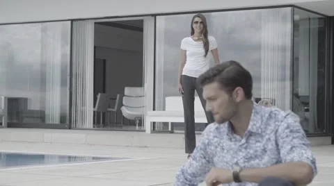 Pretty girl man models posing to camera sunglasses Stock Footage 68709404