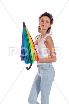 Pretty girl posing with color umbrella Stock Photos