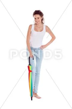 Pretty girl posing with color umbrella on white background Stock Photos