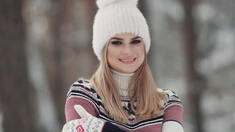 Pretty Girl Posing Smiling At The Camera In The Winter Forest. A young woman Stock Footage 93937878