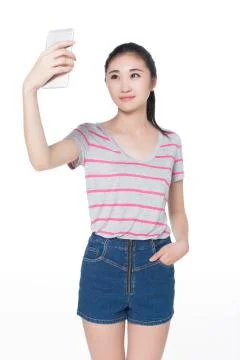 Pretty girl self-timer Stock Photos