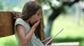 Pretty girl with tablet computer HD Footage