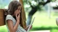 Pretty girl with tablet computer HD Footage