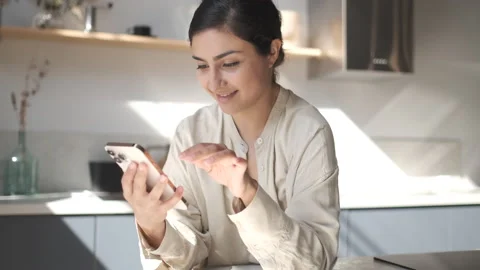 Pretty girl using smartphone internet surfing communication online. Stock Footage 250393564