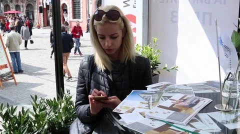 Pretty girl is using tablet PC at the cafe2 Stock Footage 63168632