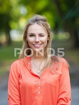Pretty girl walking outdoors Stock Photos