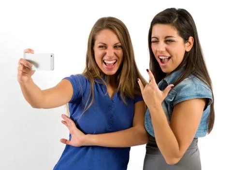 Pretty Girls Posing While Taking Selfie Photos Stock Photos