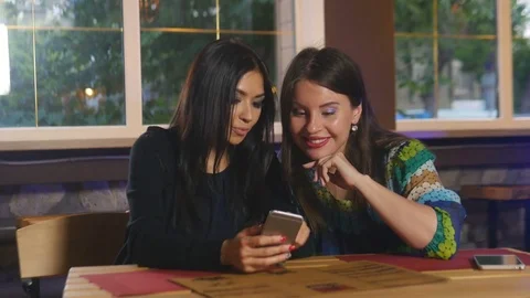 Pretty girls taking selfie at the table Stock Footage 76715403