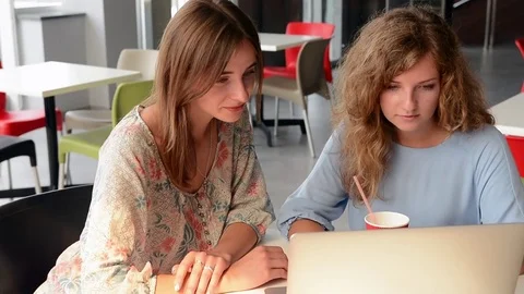 Pretty Girls Using Laptop Computer for Working in Cafe 스톡 동영상 80458435