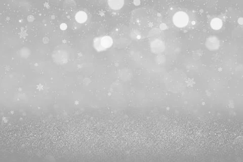 Pretty glossy abstract background glitter lights with falling snow flakes fly Illustrazione stock