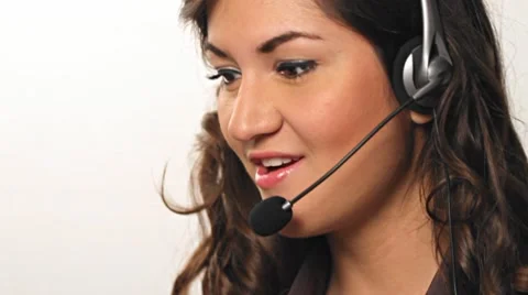 Pretty hispanic Customer service worker talking into headset Stock Footage 8518549
