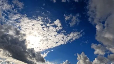 Pretty huge bright clouds in the blue sky bg - photo of nature Stock Photos