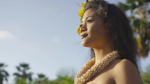 Pretty Hula Dancer Looks Out Stock Footage 219592967