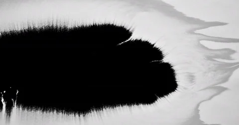 Pretty ink flow and bleeding across white background paper Vídeo Stock 81446287