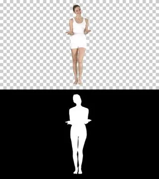 Pretty instructor explaining and describing how to do exercises before training Foto stock
