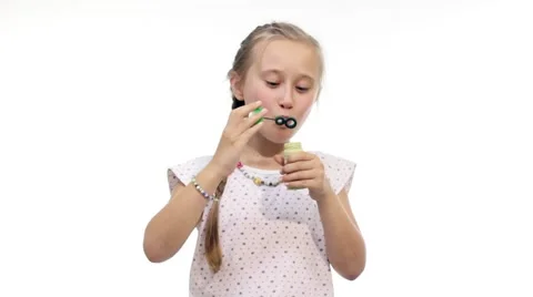 Pretty Kid Blowing Bubbles Stock Footage 51880865