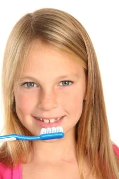 Pretty Kid Brushing Teeth Stock Photos