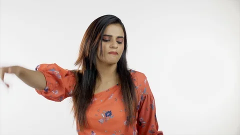 Pretty lady dancing while listening to loud music at a party against isolated Stock-Footage 113859739