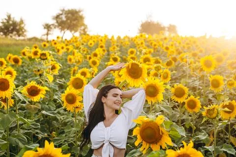The pretty lady is looking at something while posing. Stock Photos