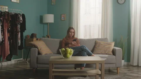 Pretty Lady with red apple and phone Stock Footage 150127012
