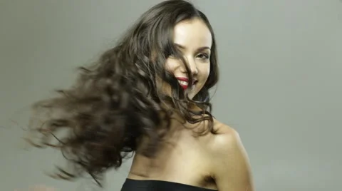 Pretty lady turning head to camera fast few times Stock Footage 63095641
