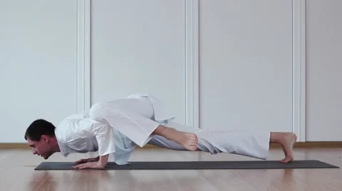 Pretty Man Doing Yoga.Chaturanga Video stock 59730175