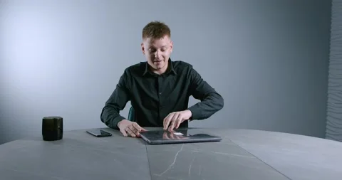 Pretty manager opens the laptop and starts working. Video stock 137670269